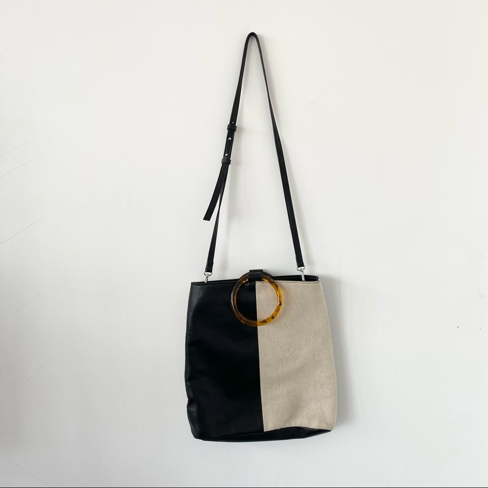 two-tone black and cream tote bag